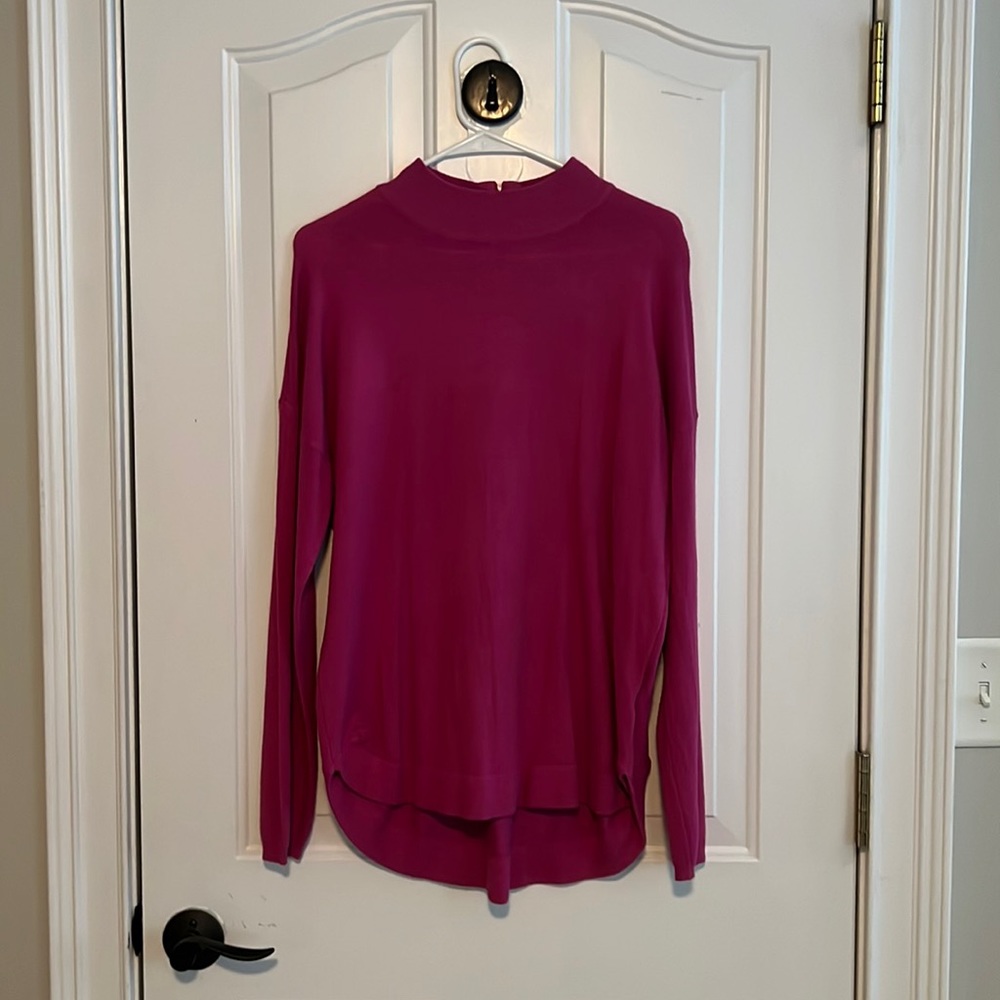 Pink turtleneck